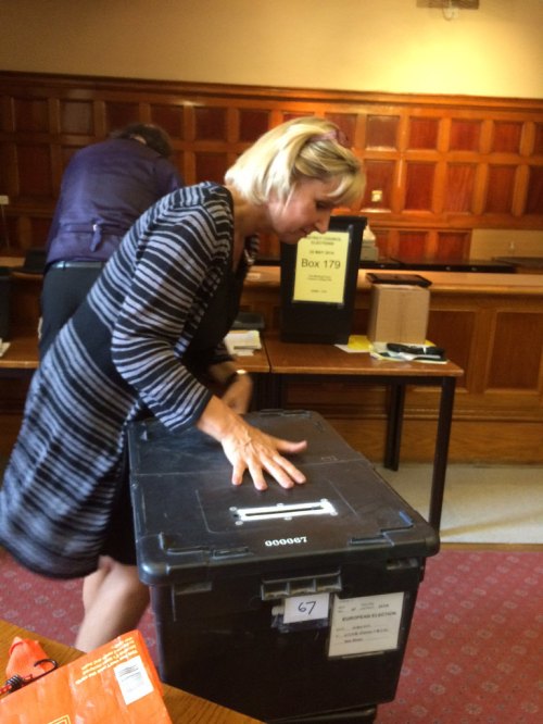 Andrea collecting her ballot boxes